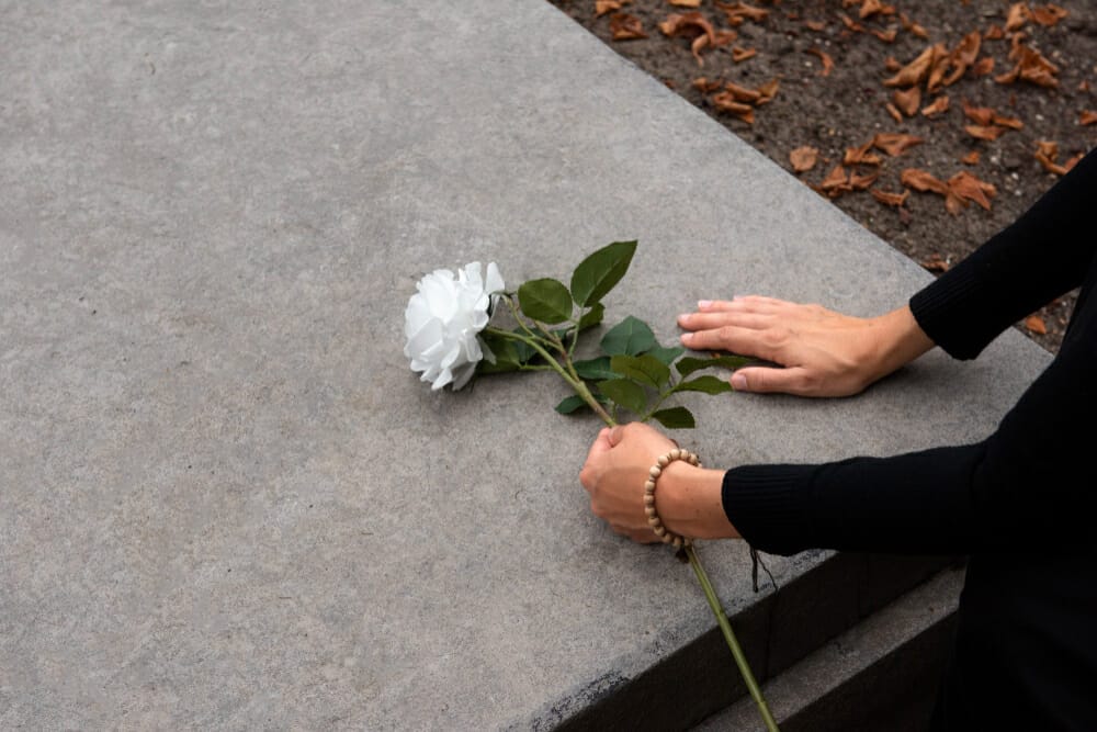 grief person flower memorial