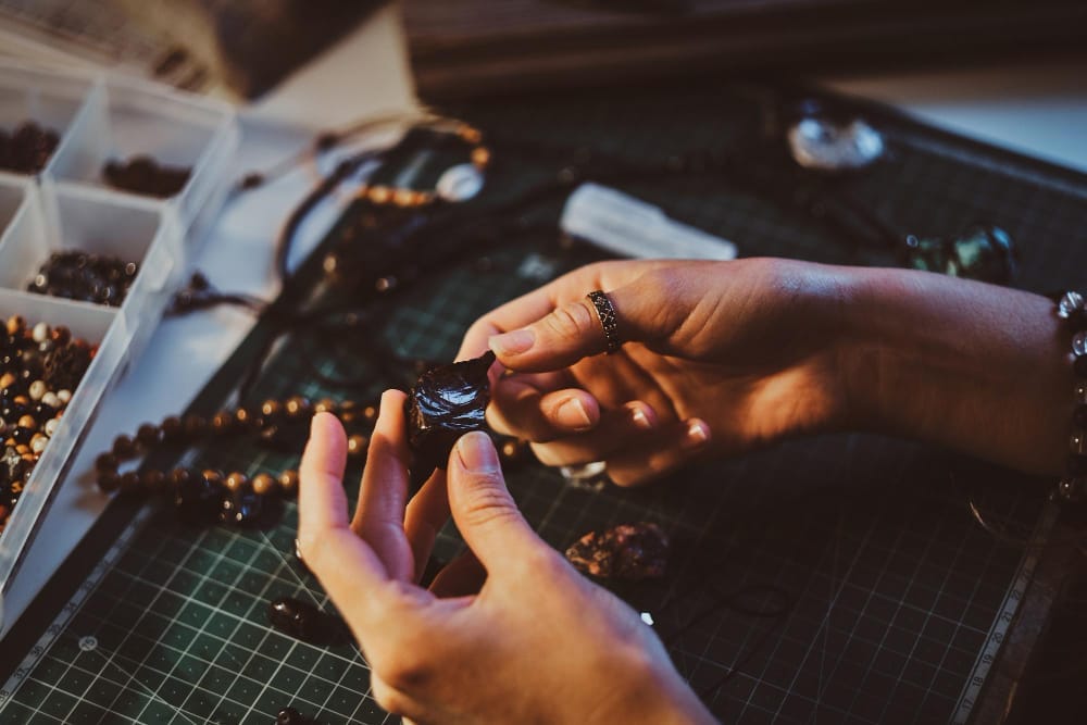 woman collecting stone jewerly example of collector